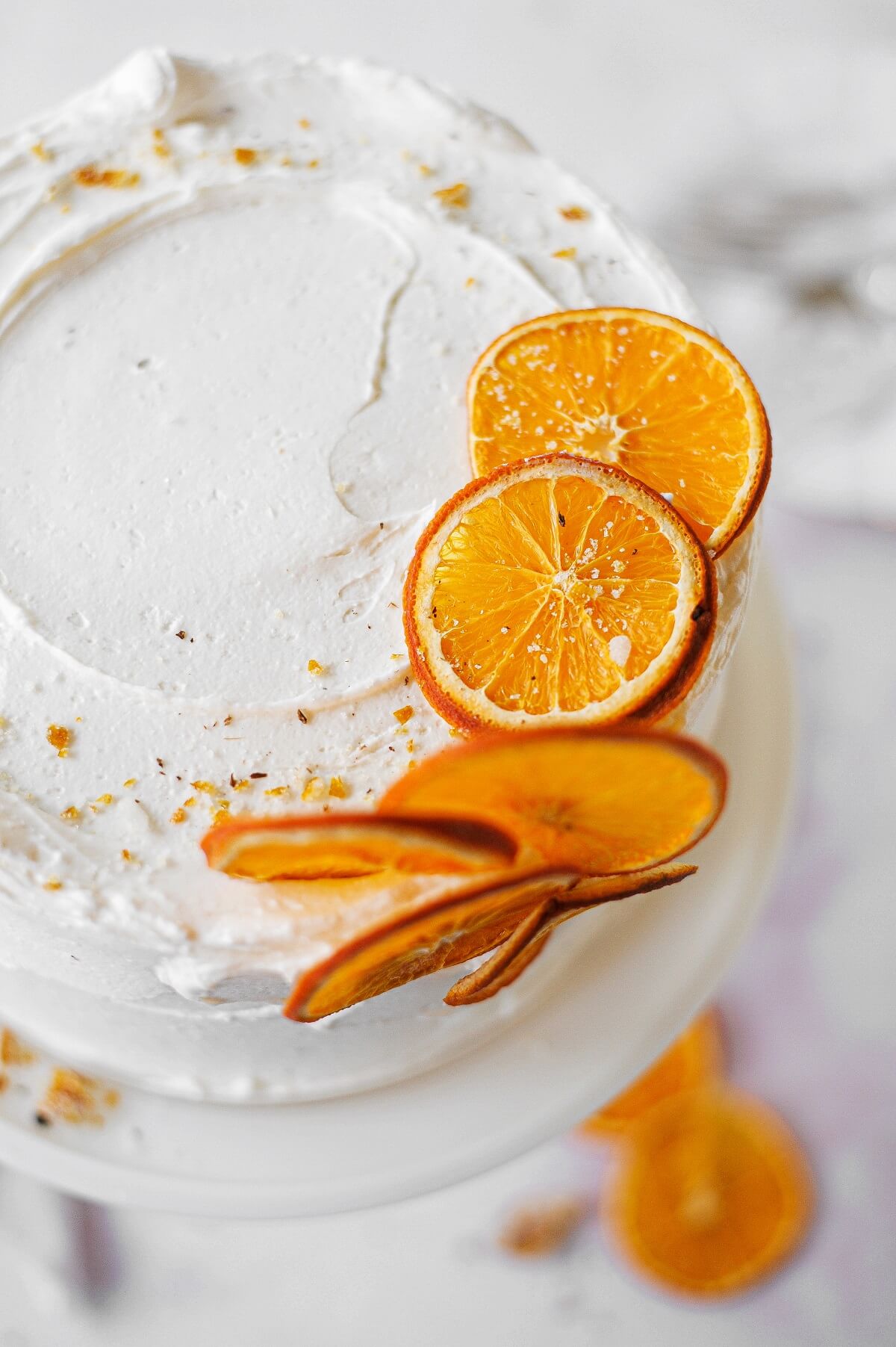 Premium Photo | Orange cake with orange shape on grunge wooden table and  cup of tea