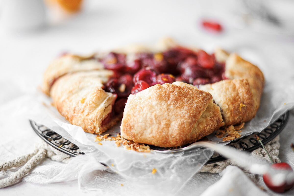Cherry galette with a flaky pie crust.
