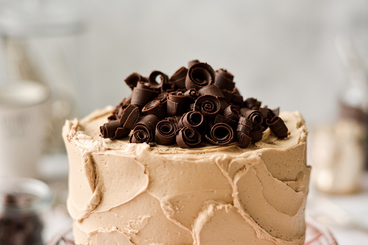 Chocolate espresso cake with coffee buttercream and chocolate curls.