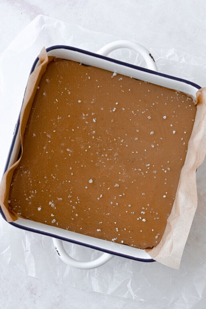 A pan of uncut salted caramels.