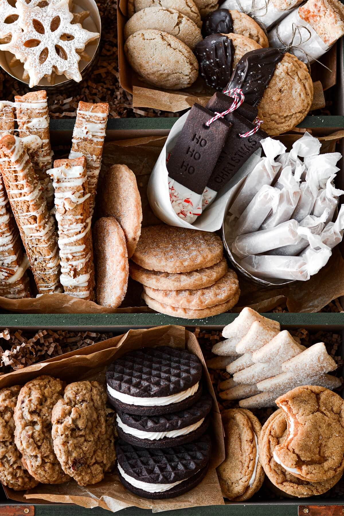 A Christmas cookie box filled with 12 different cookies.