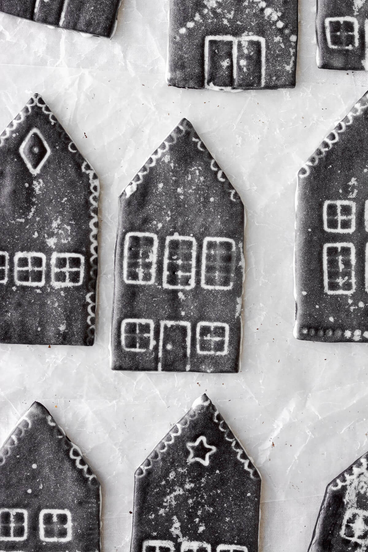 Iced chocolate sugar cookie houses.