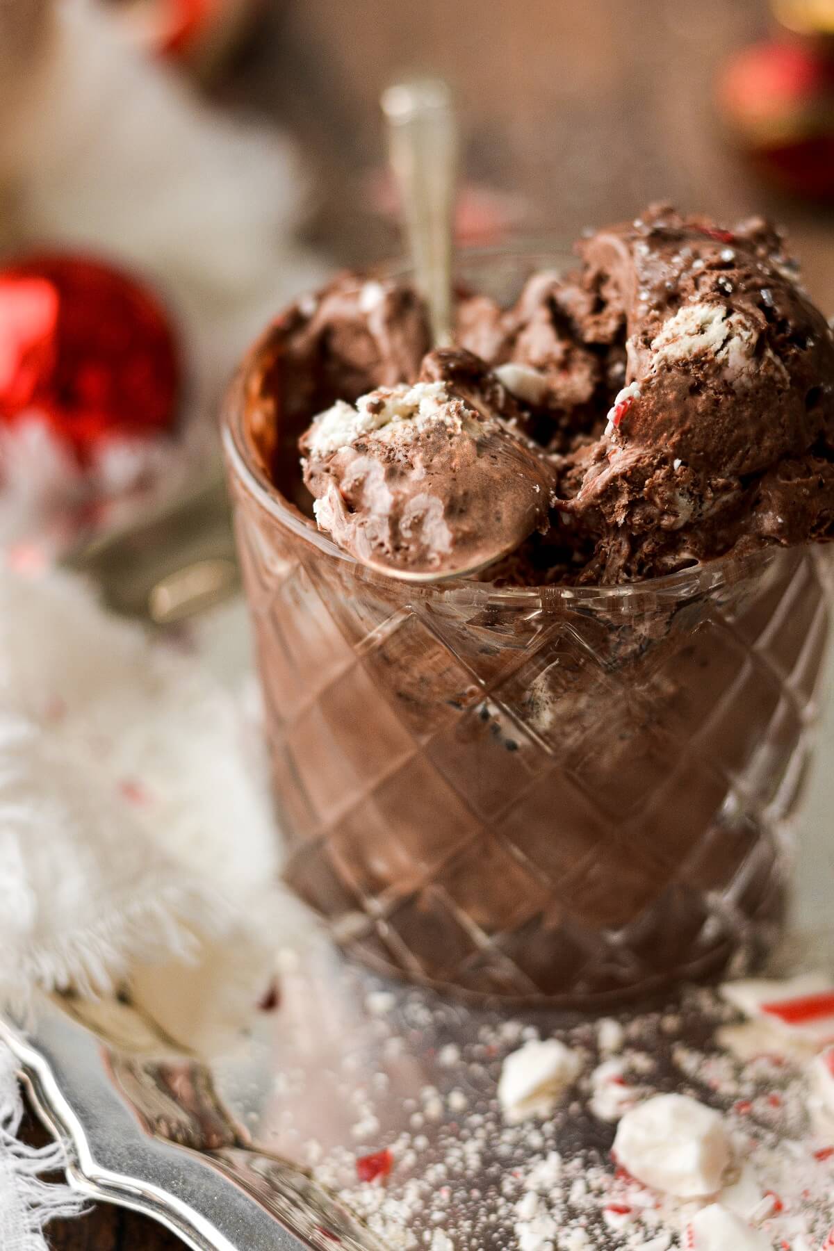 Chocolate peppermint ice cream with a bite taken.