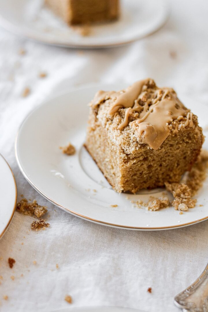Pieces of gingerbread coffee cake, drizzled with maple icing.