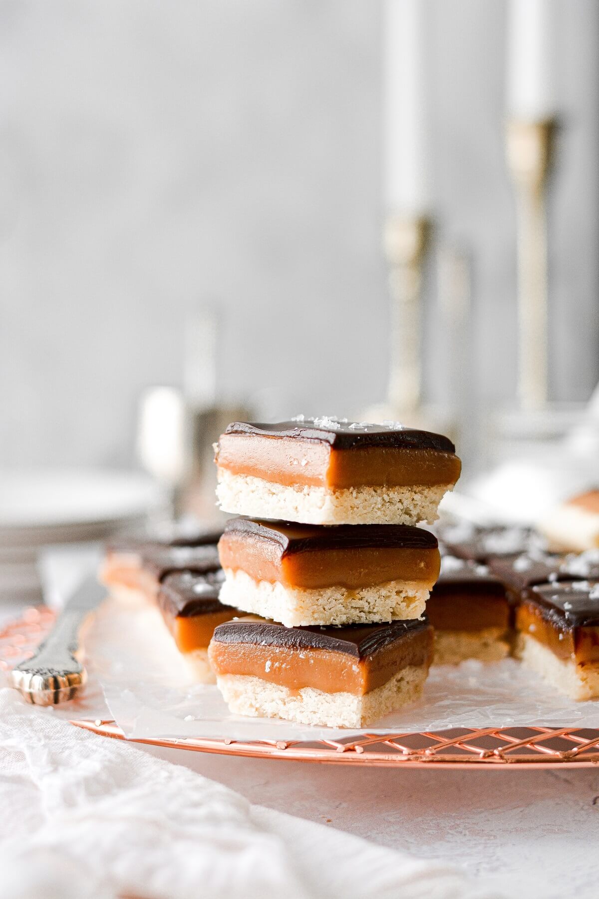 Millionaire's Shortbread, cut into squares, and stacked.