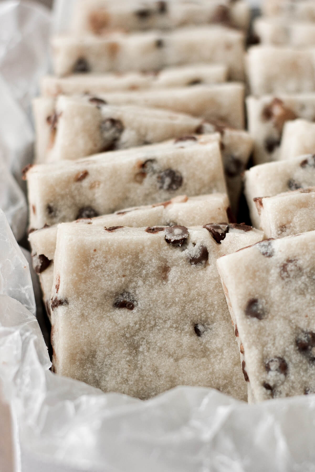 Squares of chocolate chip toffee shortbread.