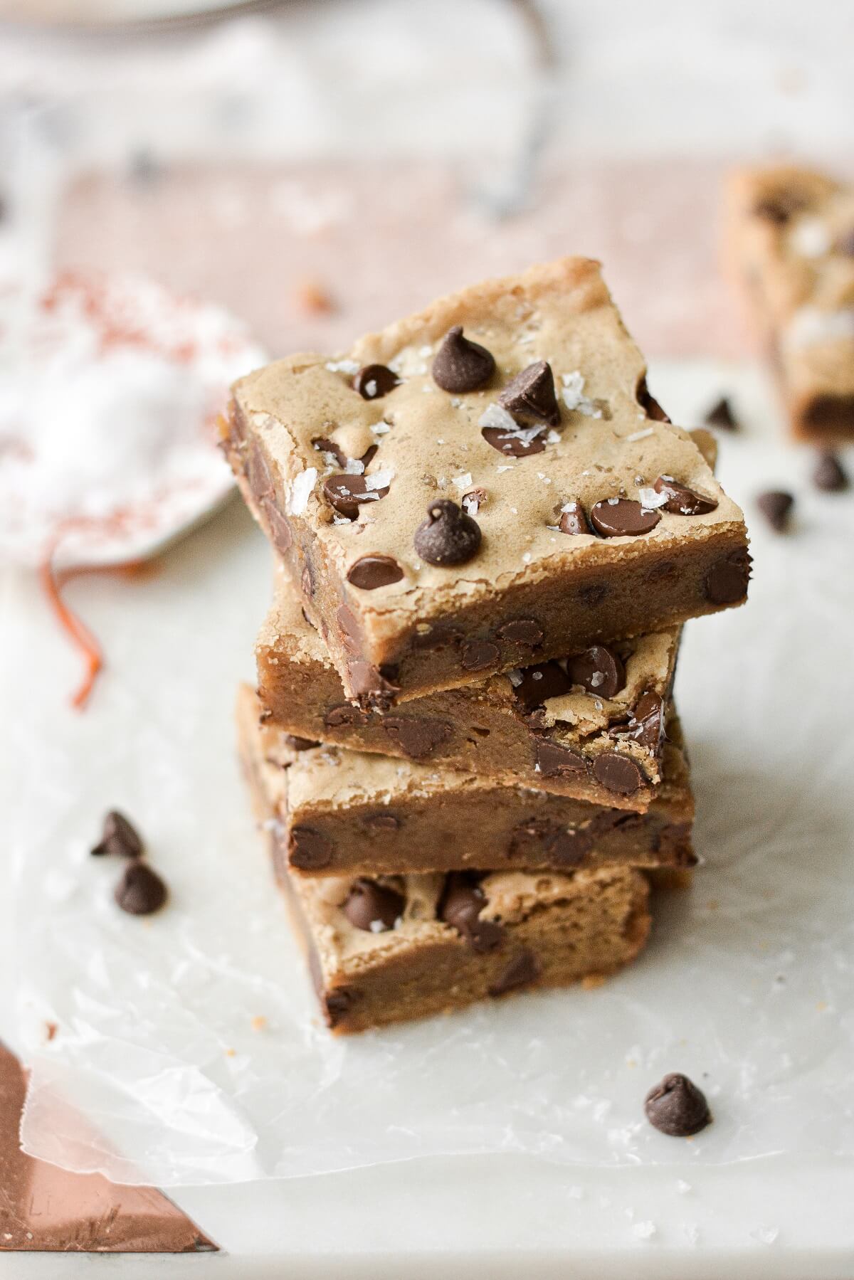 Cookie butter chocolate chip cookie bars, stacked on top of each other.