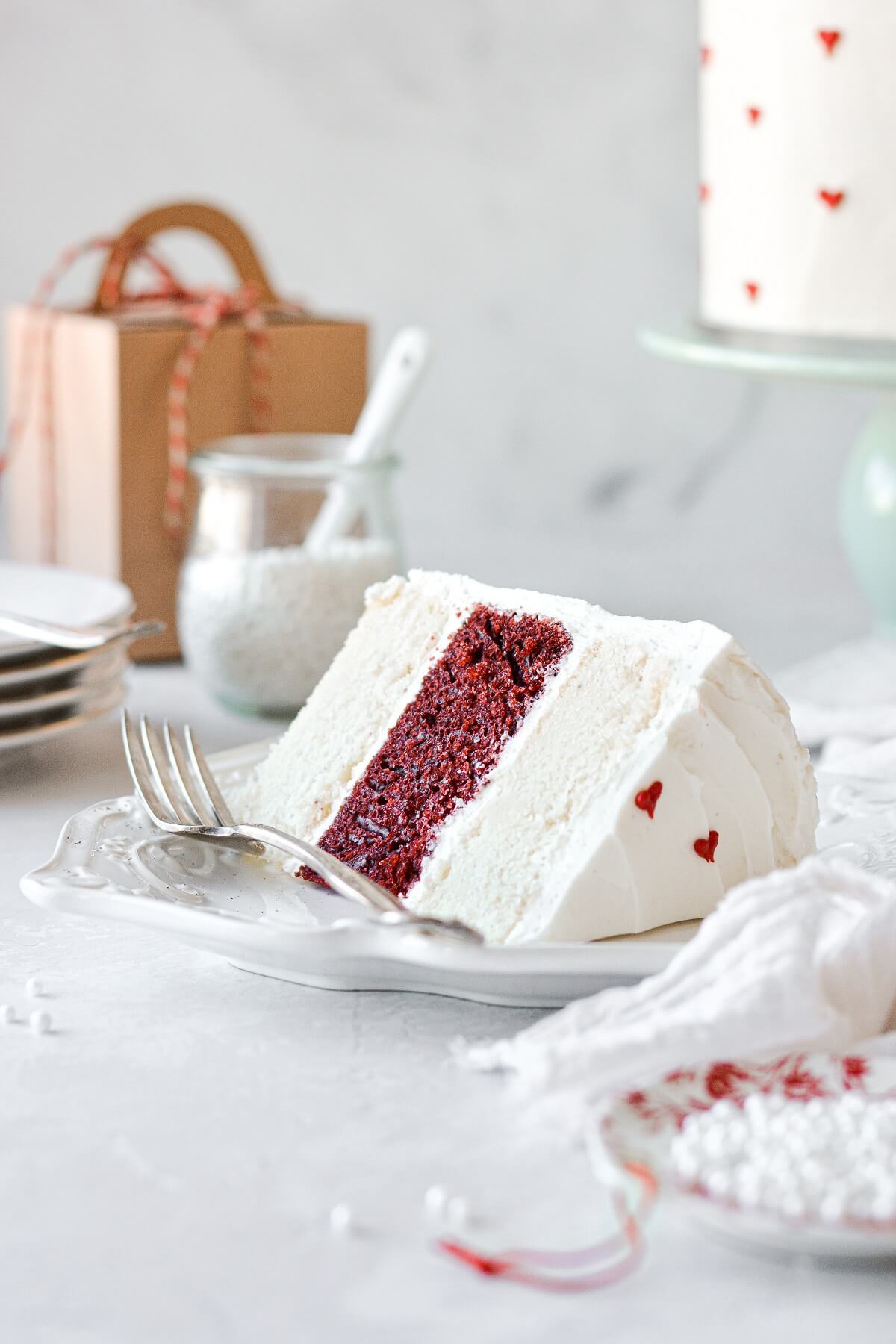 A slice of red and white striped cake for Valentines.