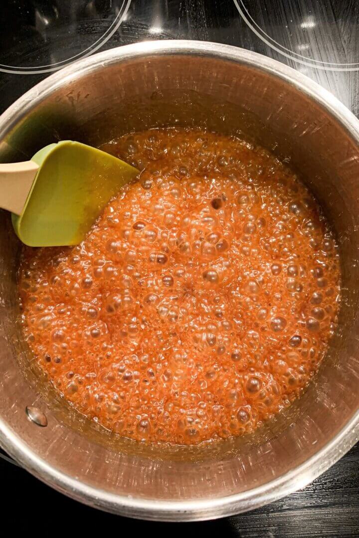 A pot of bubbling sugar to make caramel sauce.