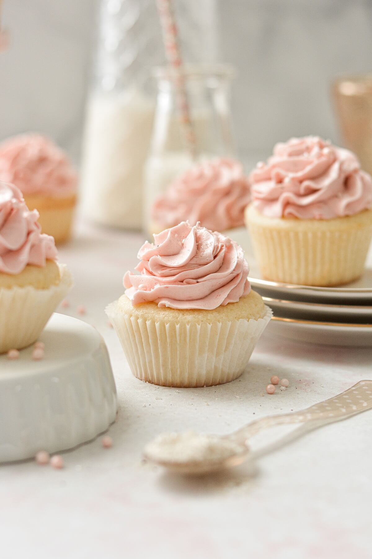 Strawberry cupcakes with ruffly pink strawberrhy buttercream.