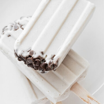 Banana coconut milk popsicles with chocolate chips inside.