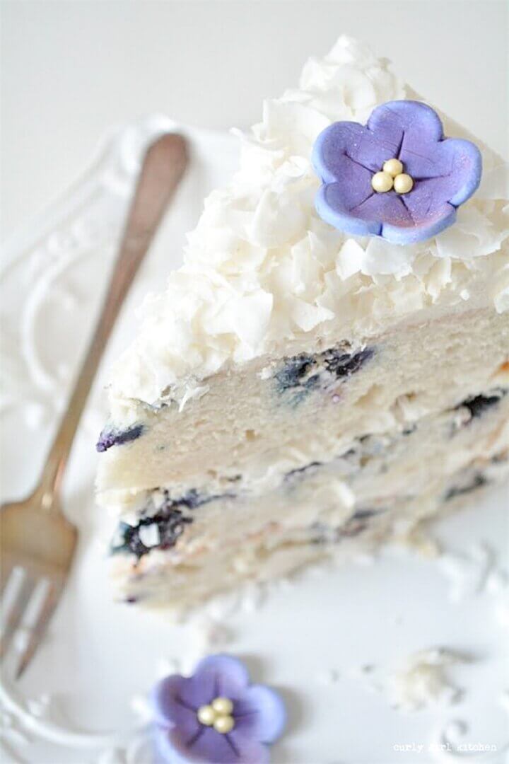 A slice of blueberry coconut cake.