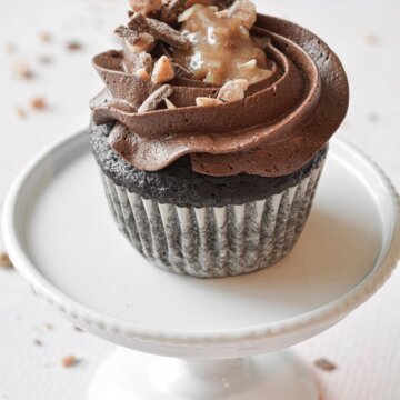 A German chocolate bourbon cupcake with chocolate buttercream and pecan, coconut caramel filling.