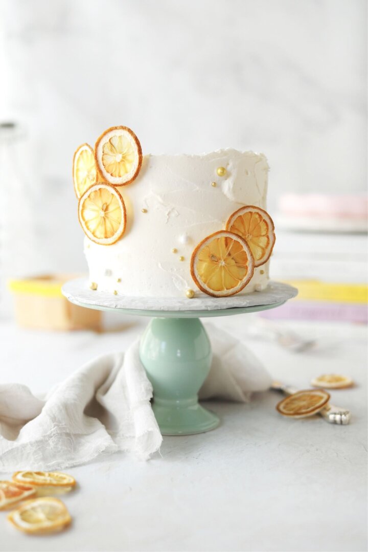 Lemon cake decorated with dried lemon slices.