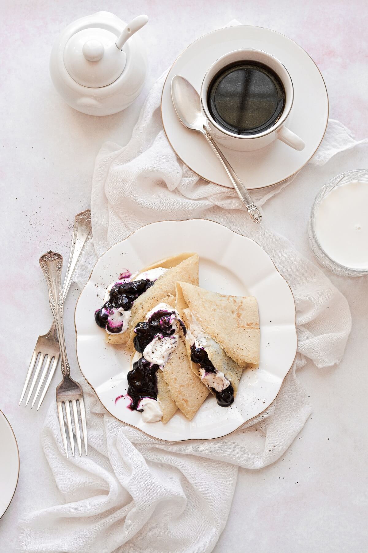 Crepes filled with whipped cream cheese and blueberry compote.