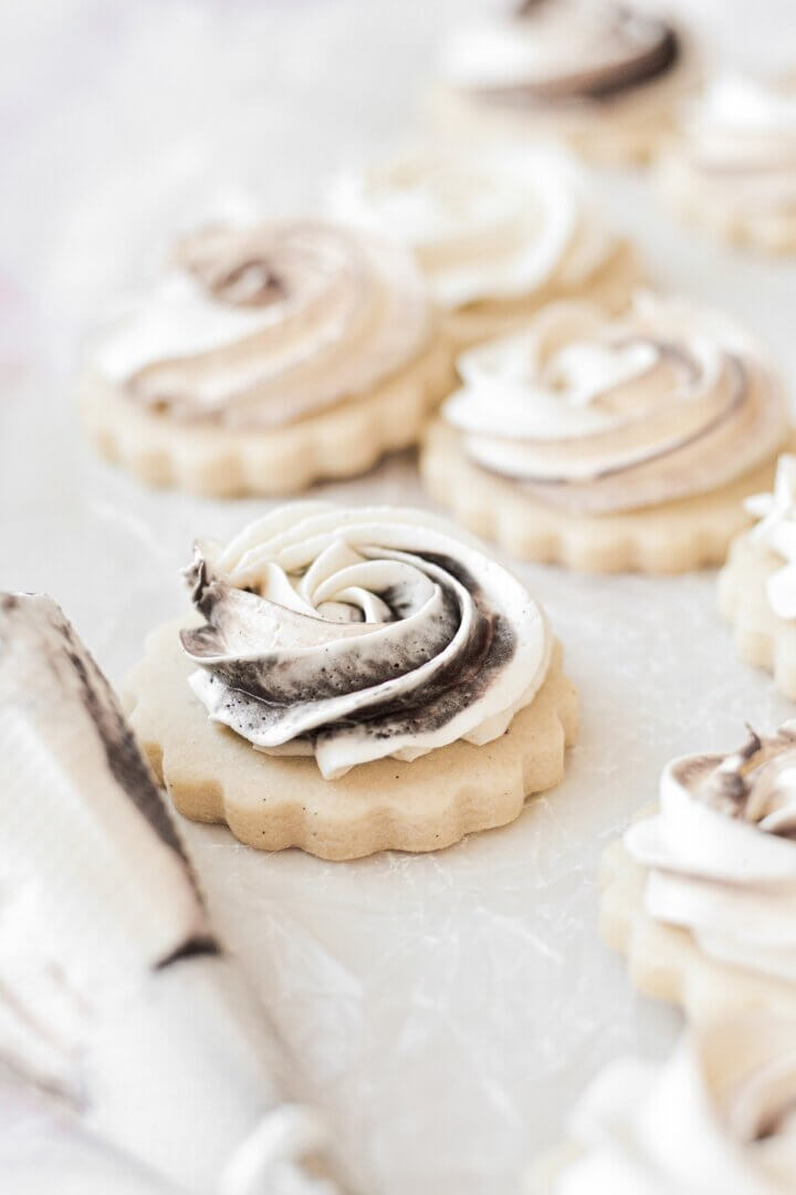 Shortbread cookies frosted with a swirl of chocolate and vanilla buttercream.
