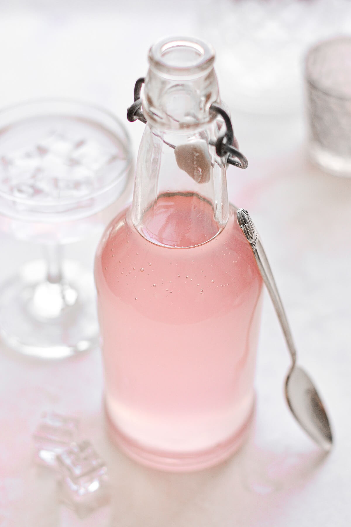 Rhubarb simple syrup in a glass bottle.