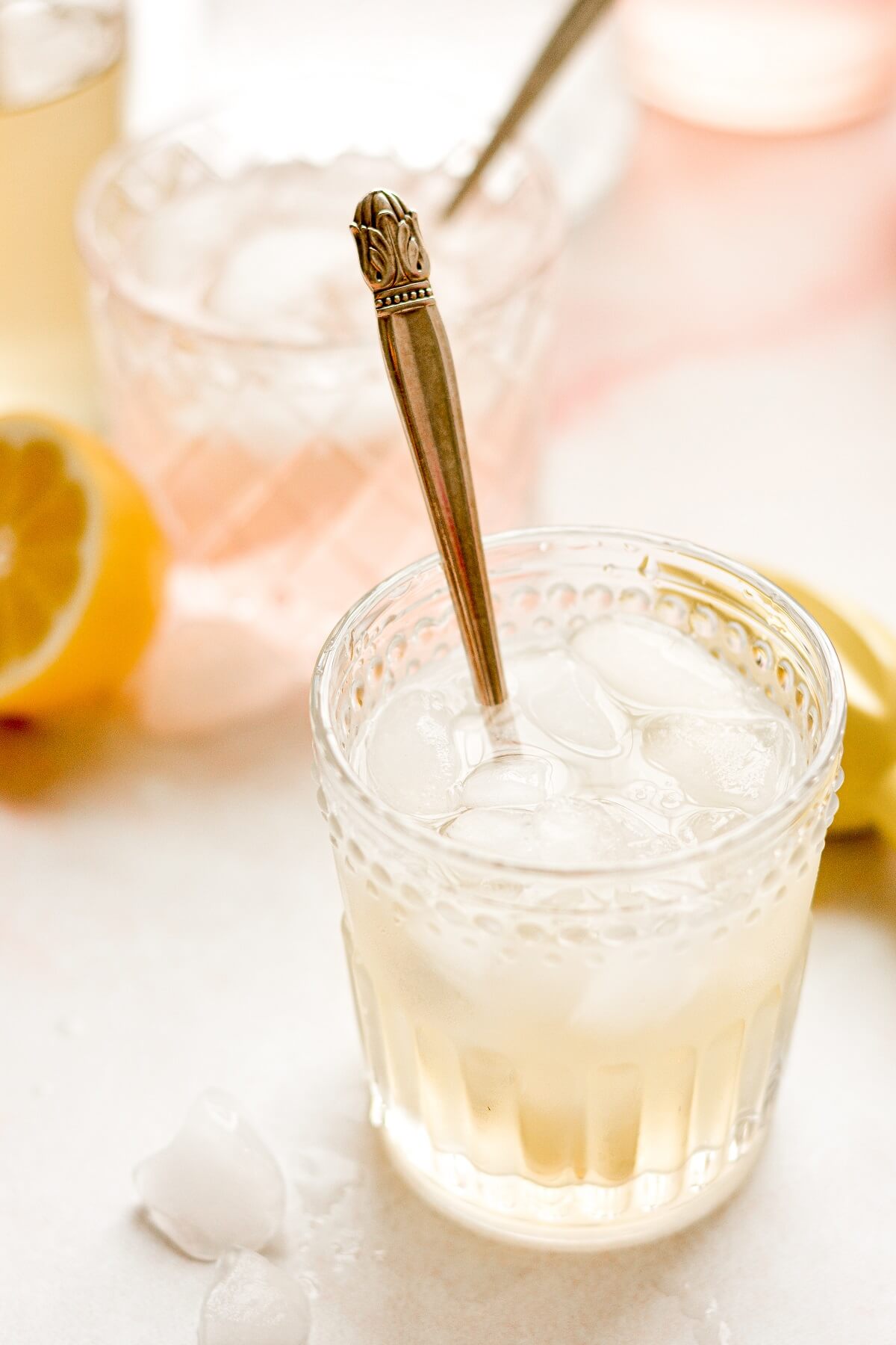 A glass of lemonade, sweetened with ginger syrup.