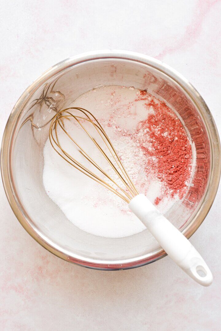 A bowl of ingredients for homemade rhubarb curd.