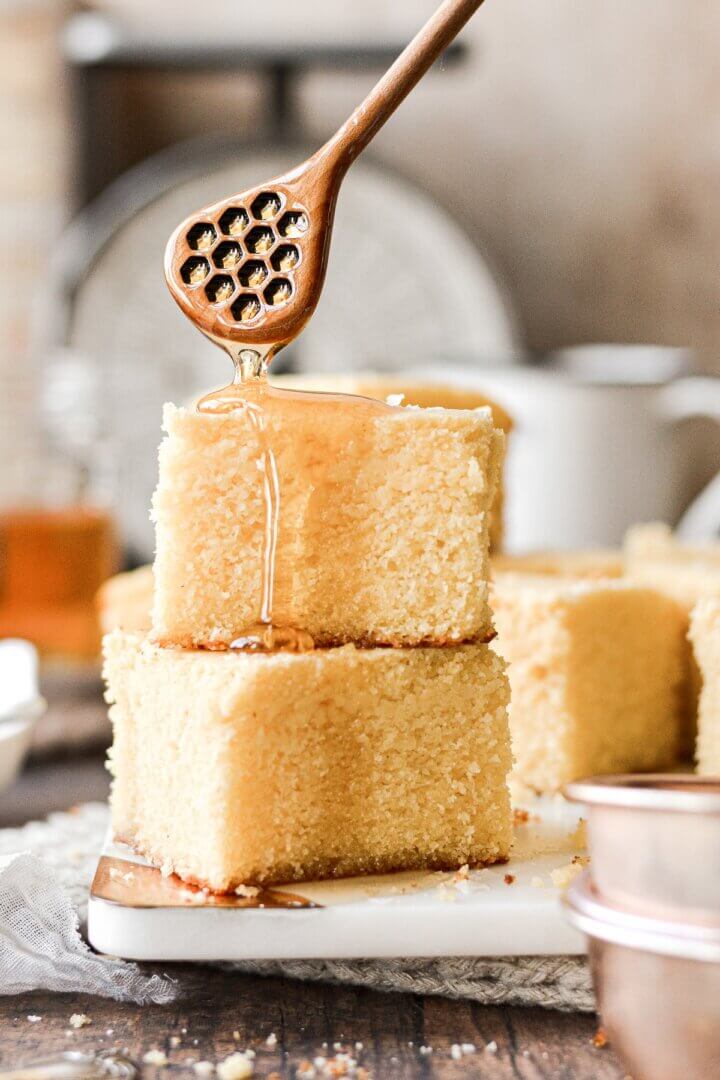 Honey drizzling over the top of cornbread.