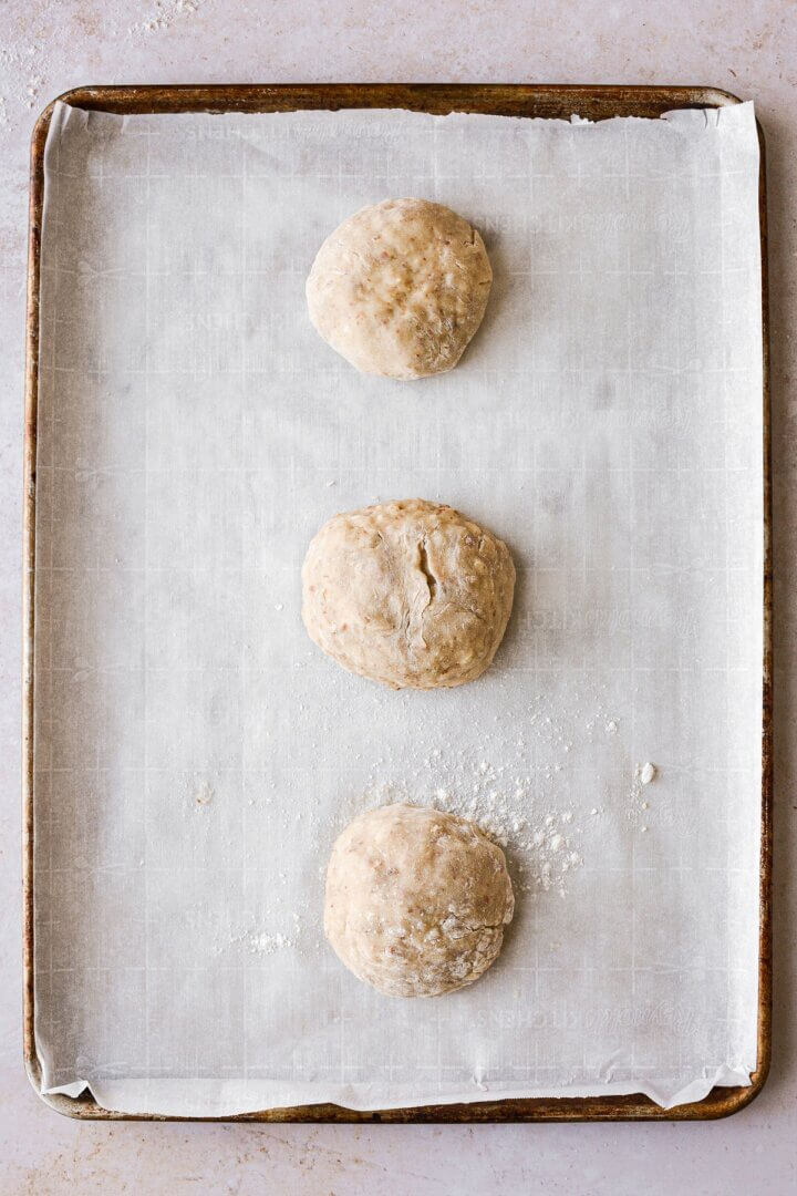 Biscotti dough divided into three portions.