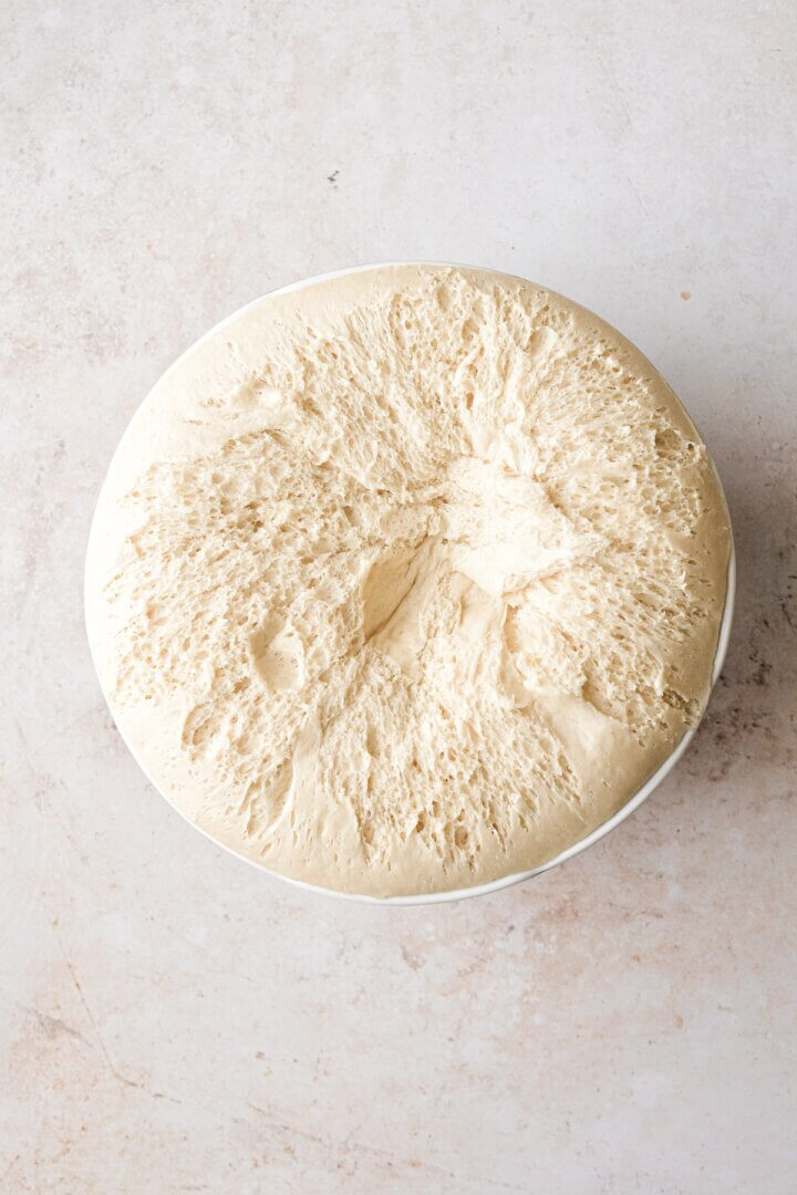 Dough that's risen to the top of a bowl.