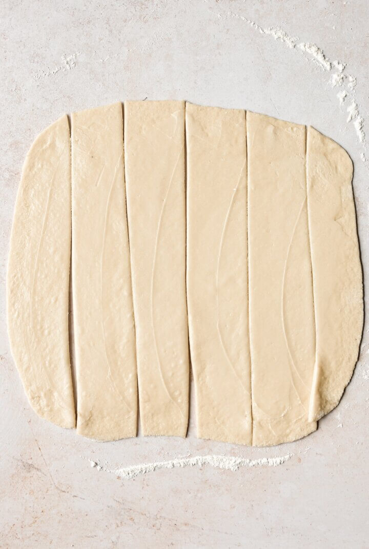 Bread dough cut into strips.