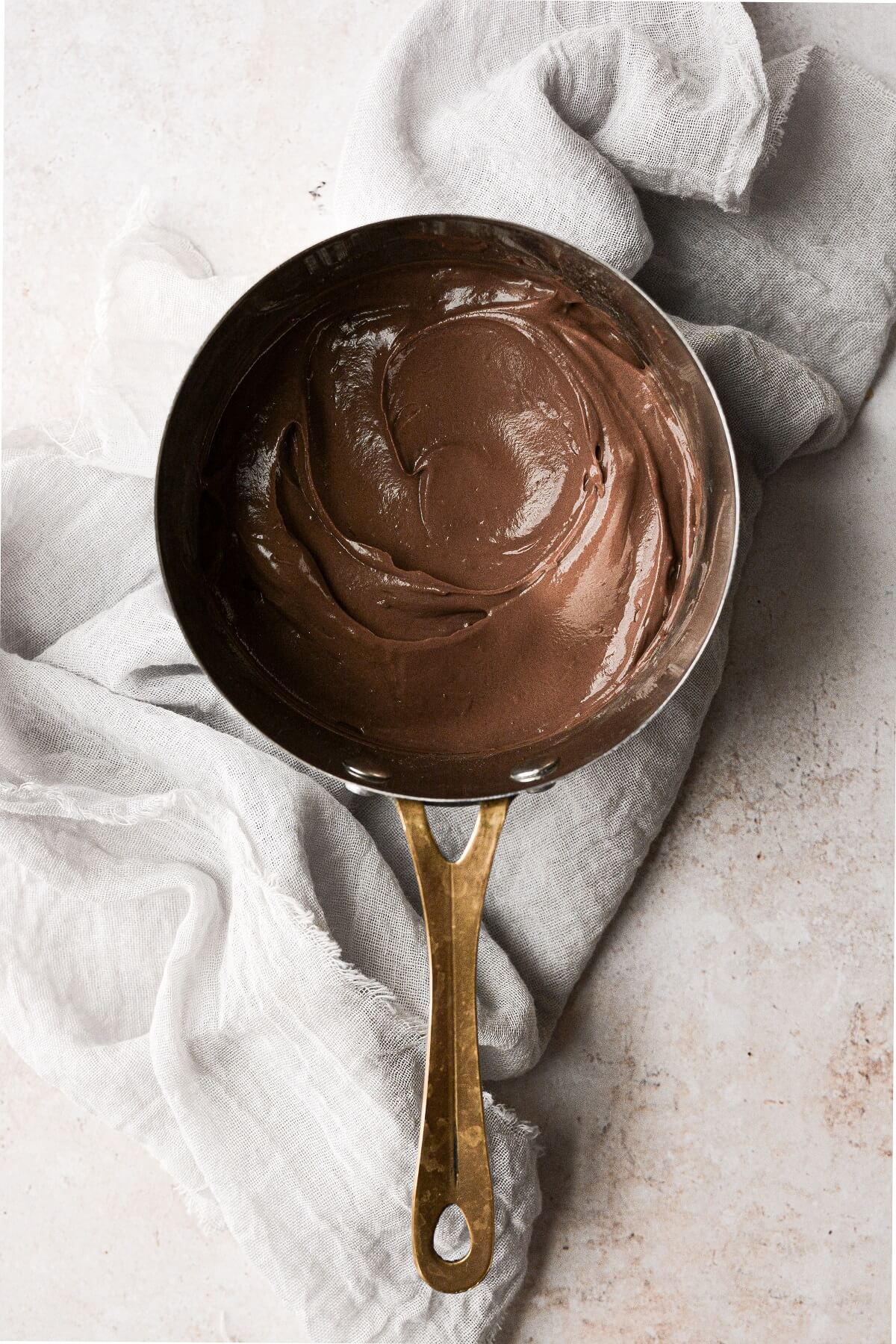 Chocolate custard in a saucepan.