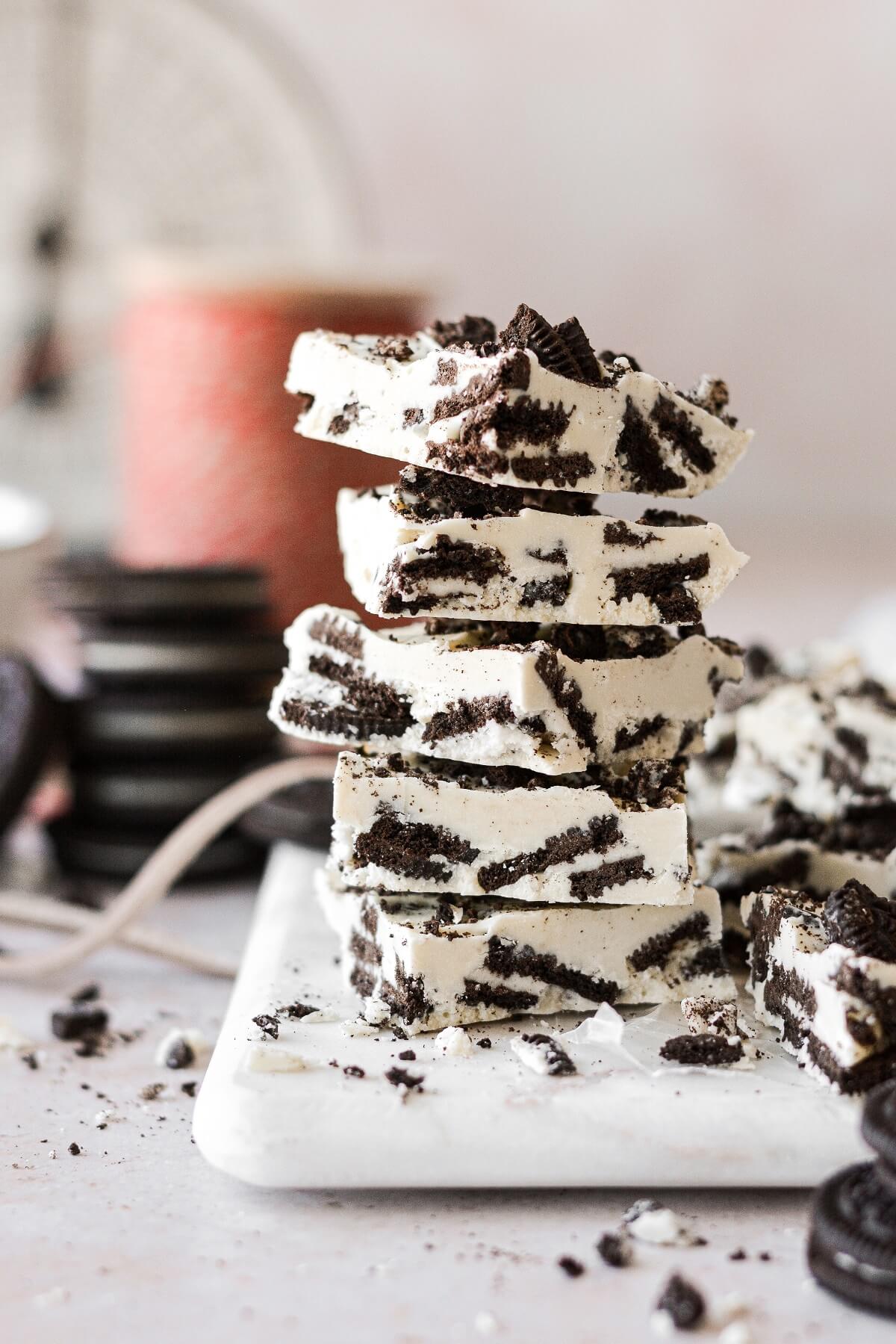 Cookies and cream bark, stacked on a marble board.