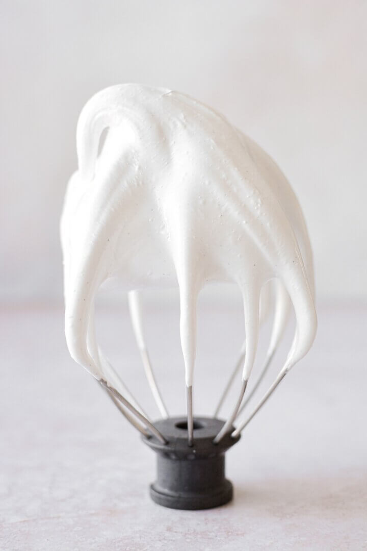 Marshmallow cream on a wire wisk.