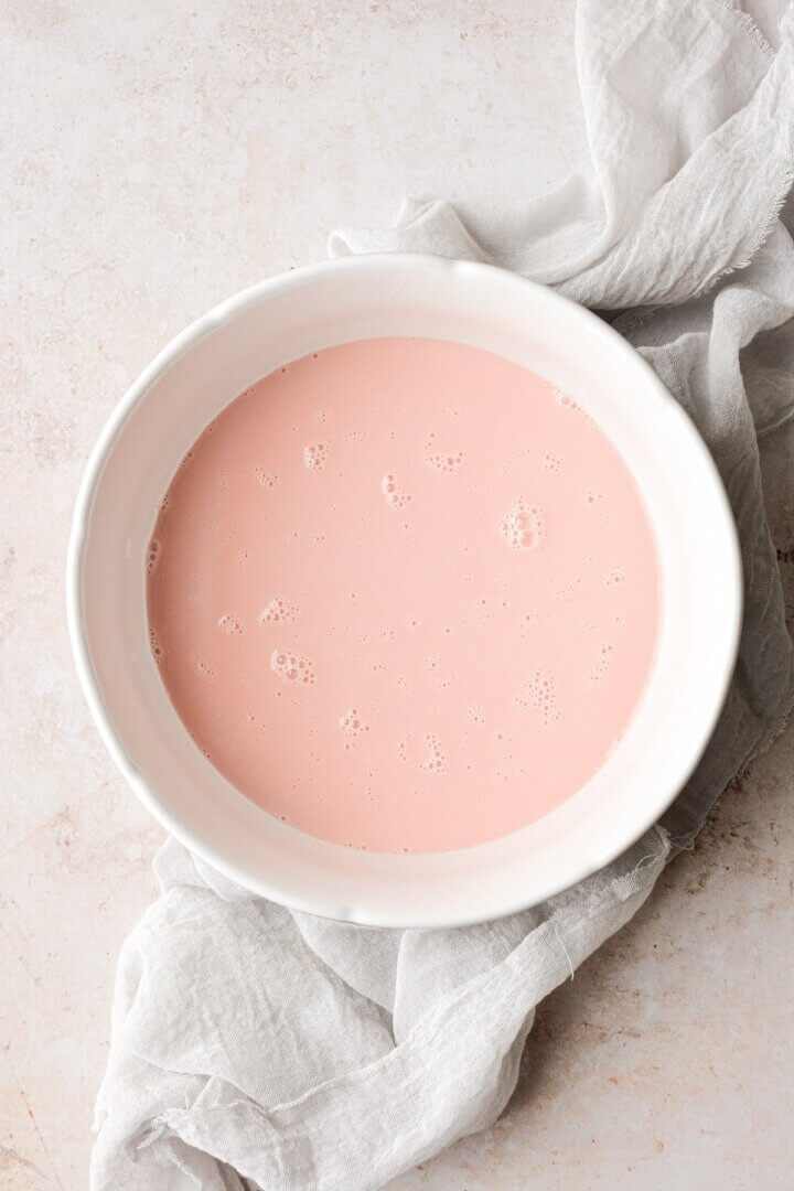 Pink peppermint custard in a bowl.