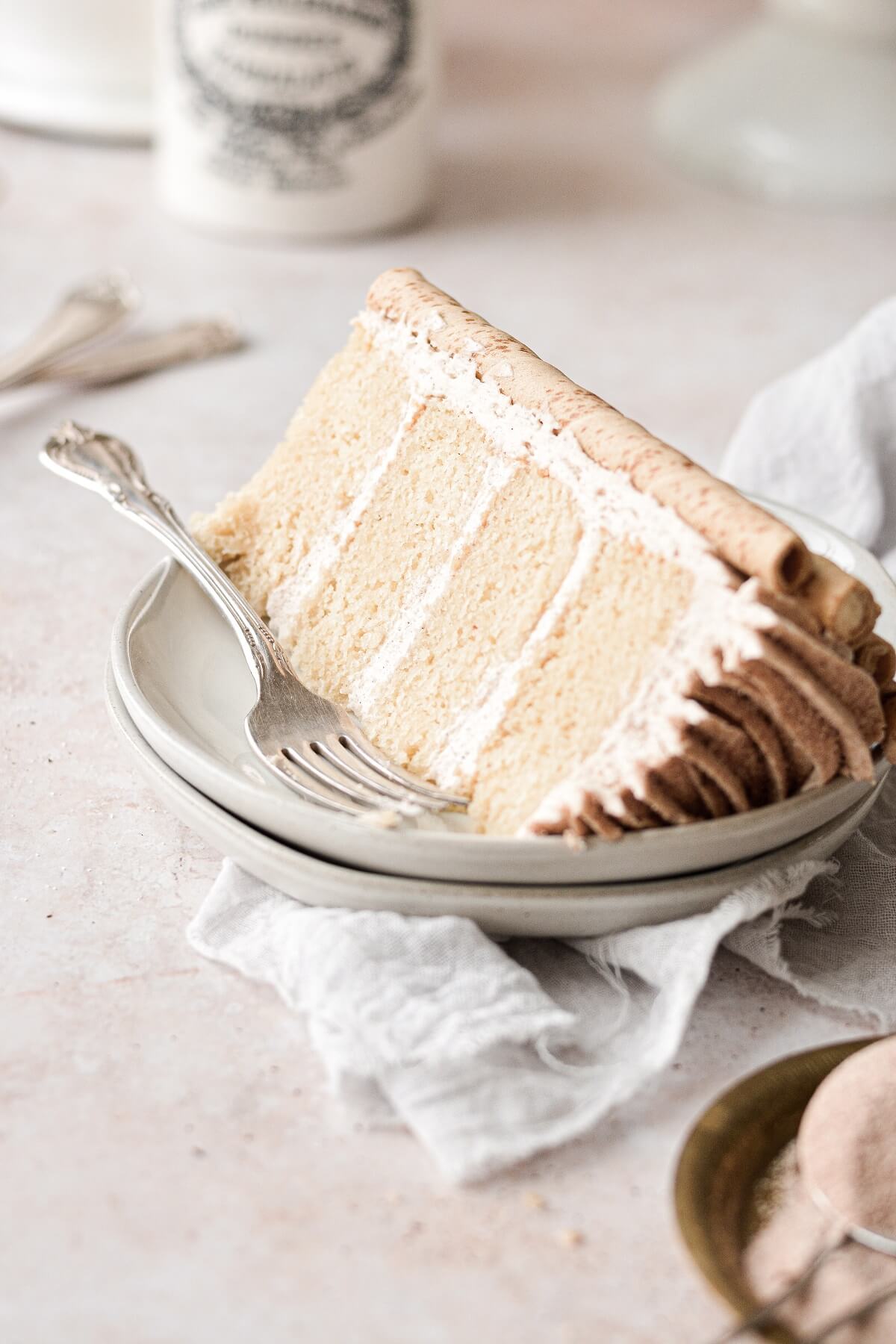 A slice of snickerdoodle cake with a vintage silver fork.