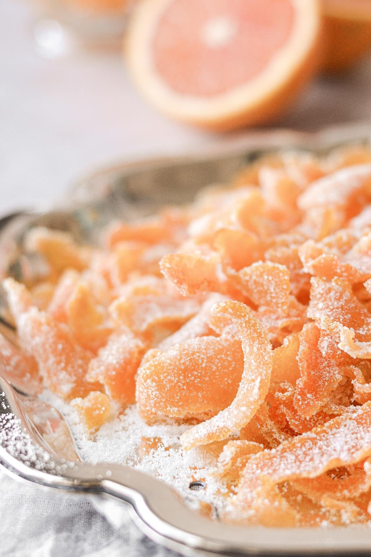 Candied orange peel on a silver tray.