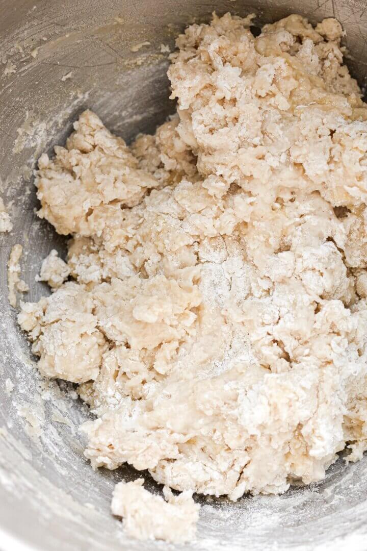 Dough being mixed in a mixing bowl.