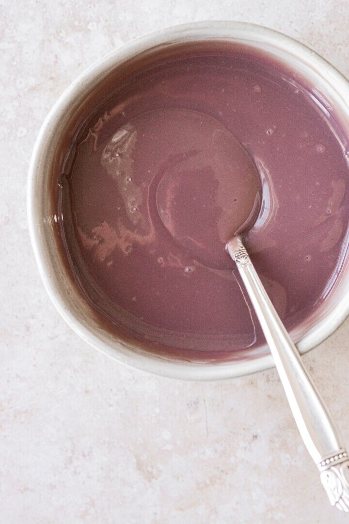 A bowl of ruby chocolate ganache for making truffles.