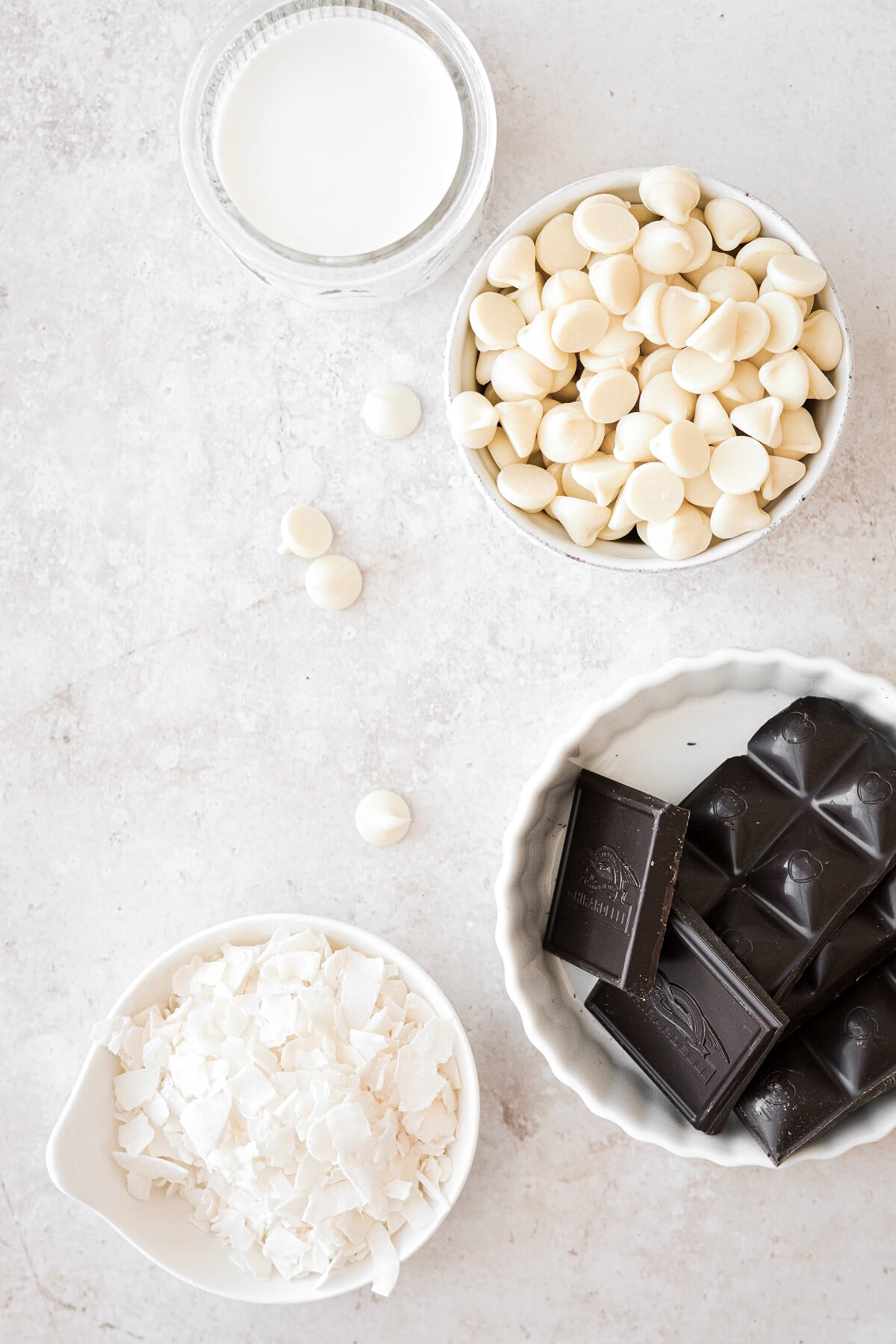 Ingredients for making white chocolate coconut truffles.