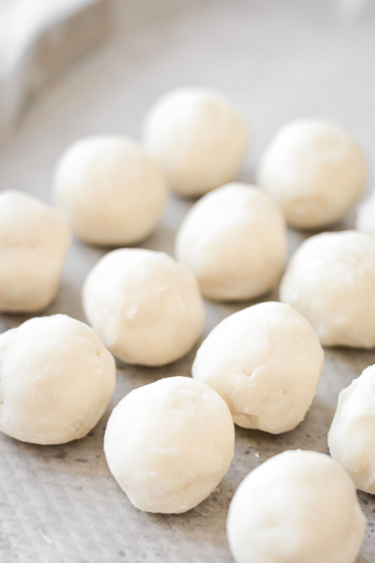 Balls of white chocolate coconut ganache.