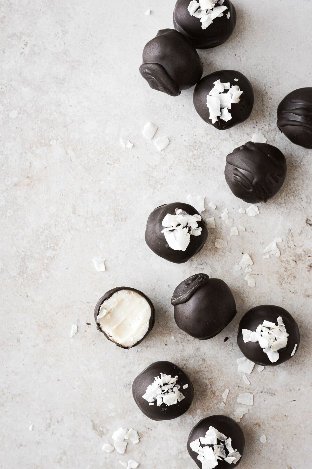 White chocolate coconut truffles coated in dark chocolate.