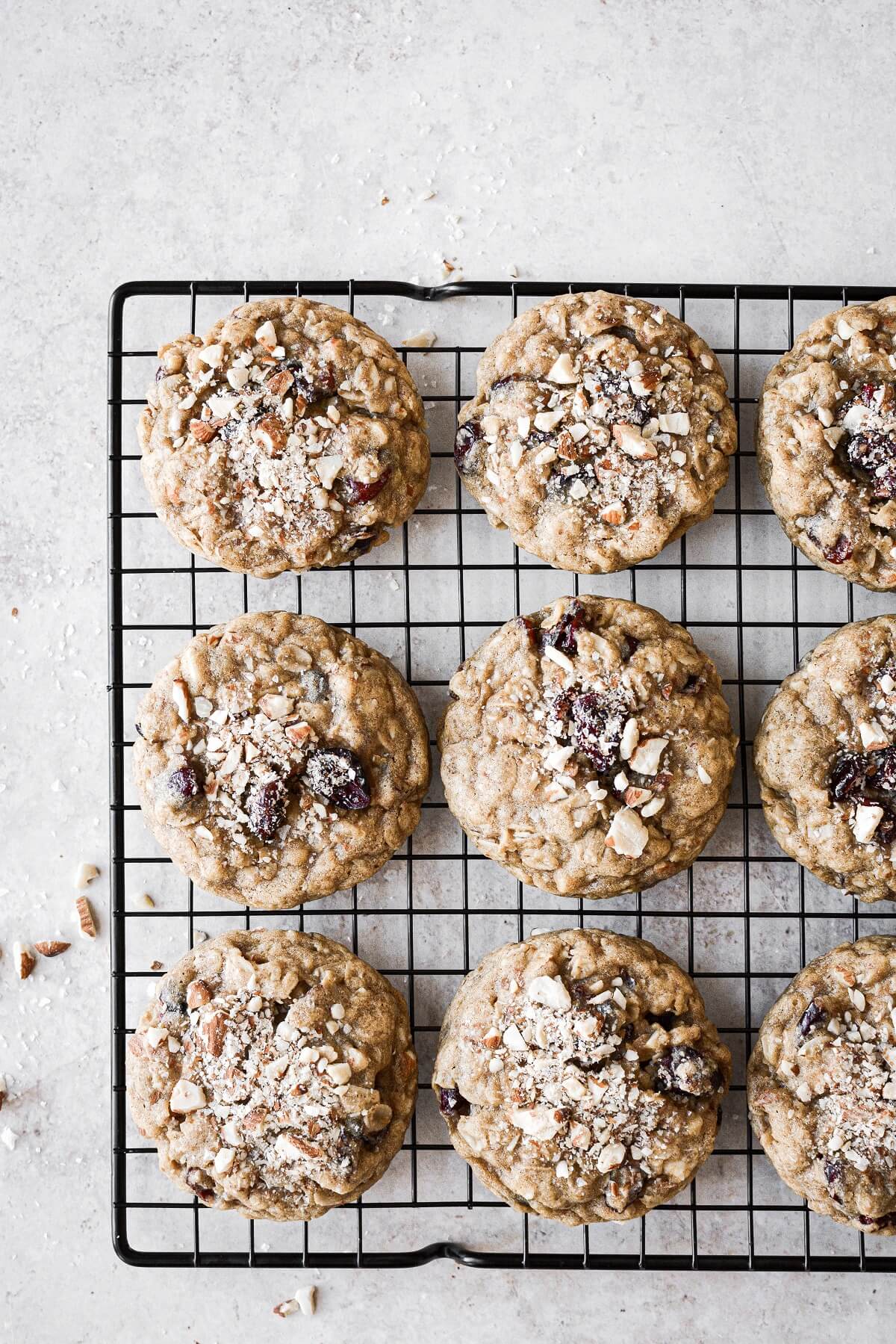 Cranberry almond oatmeal cookies on a cooling rack.