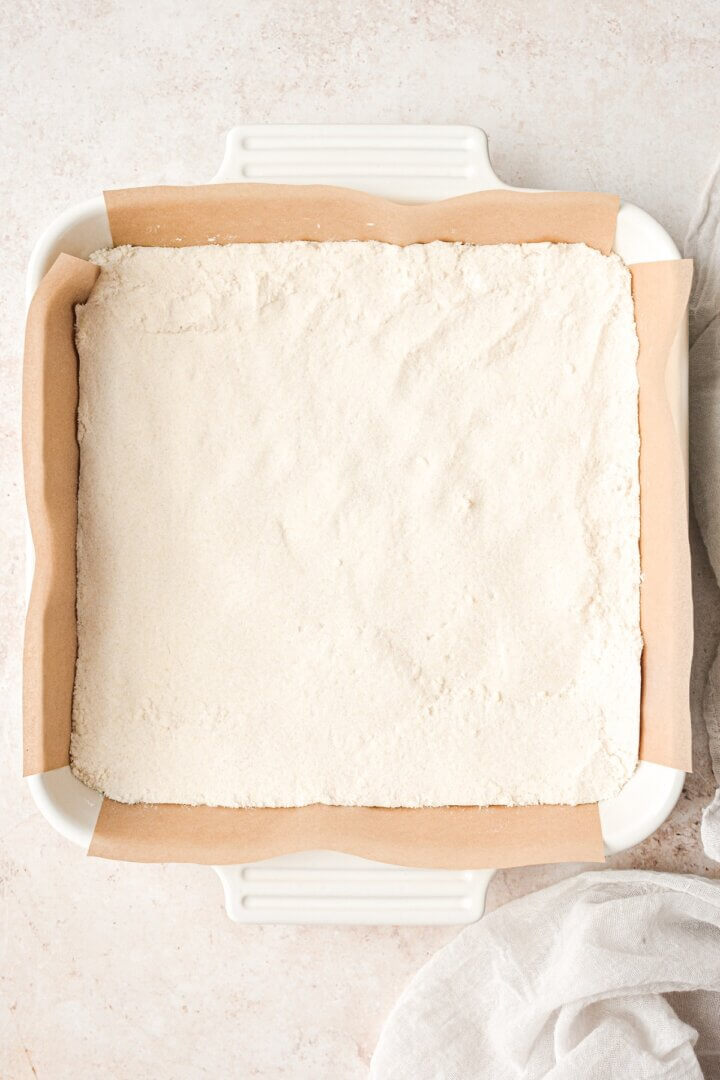 Shortbread crust pressed into a pan.