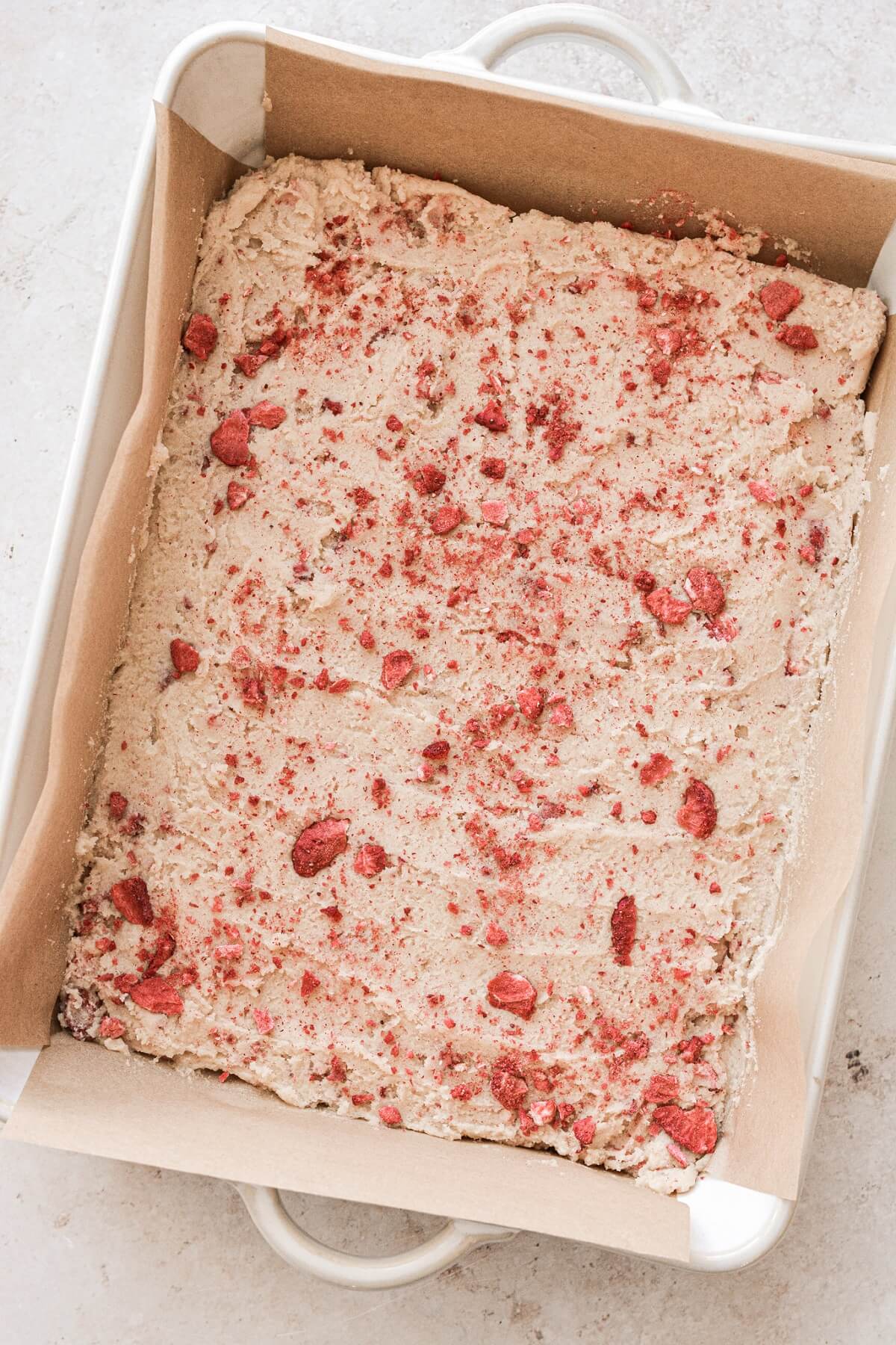 Strawberry cookie bar dough ready to be baked.