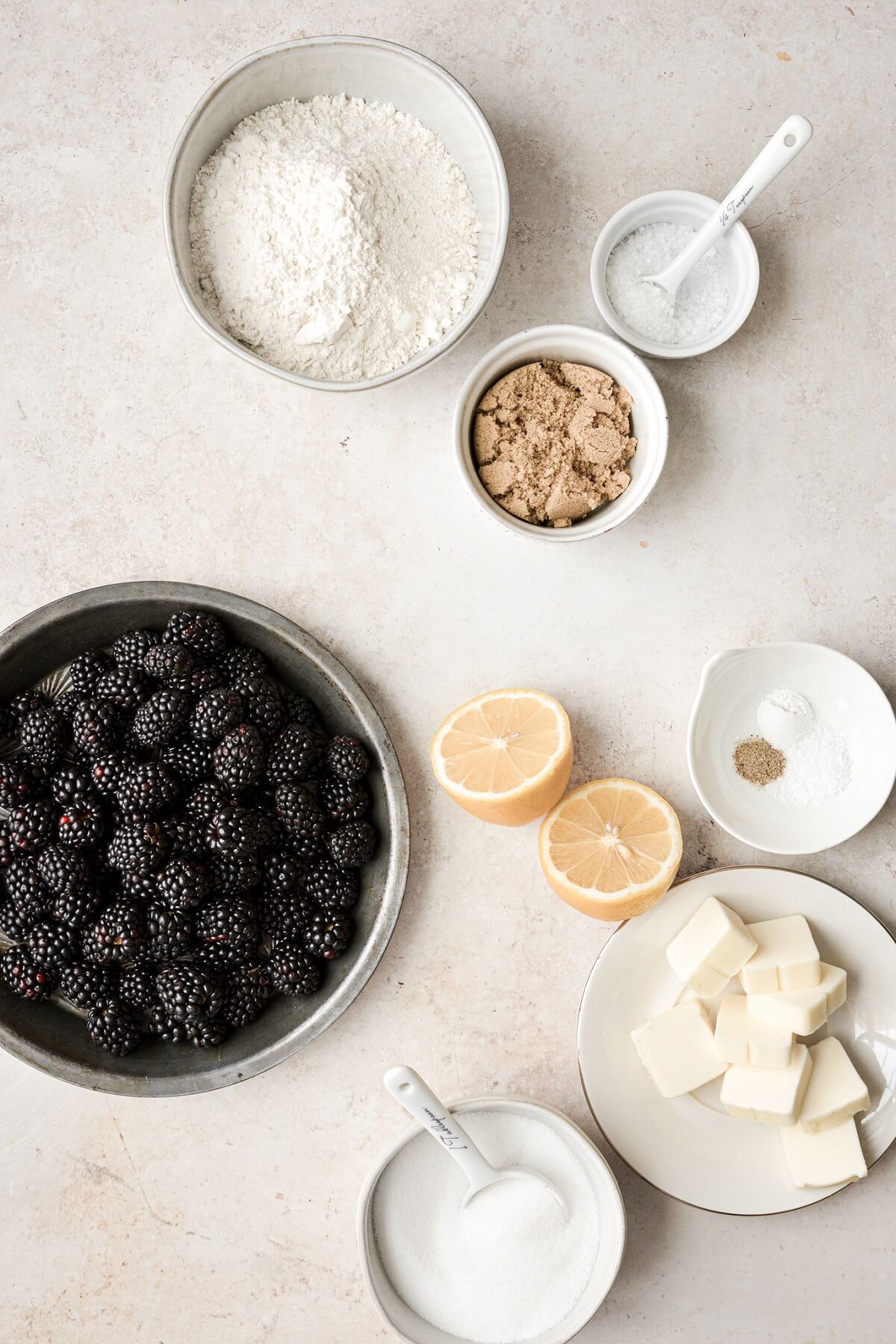 Ingredients for making blackberry crumb pie bars.