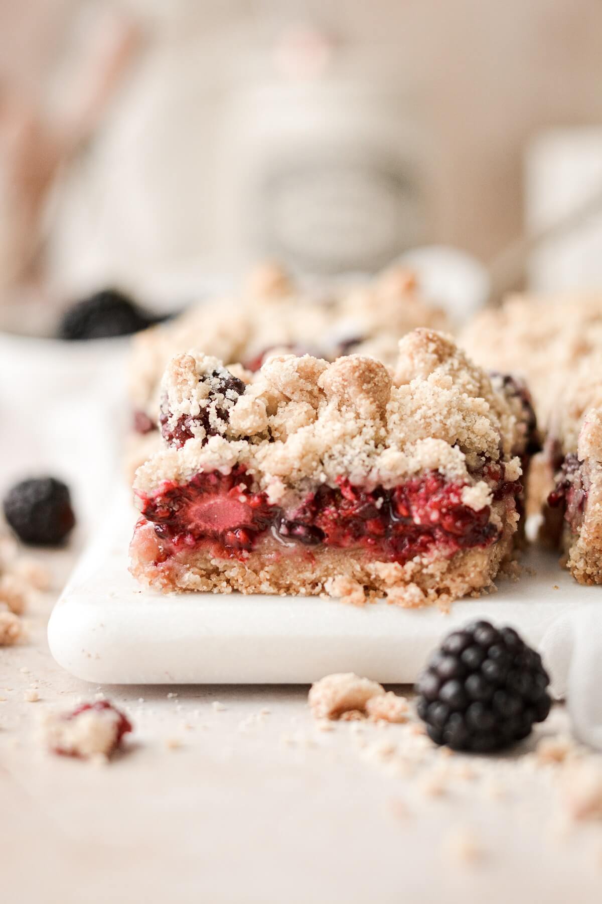 Blackberry pie bar with crumb topping.