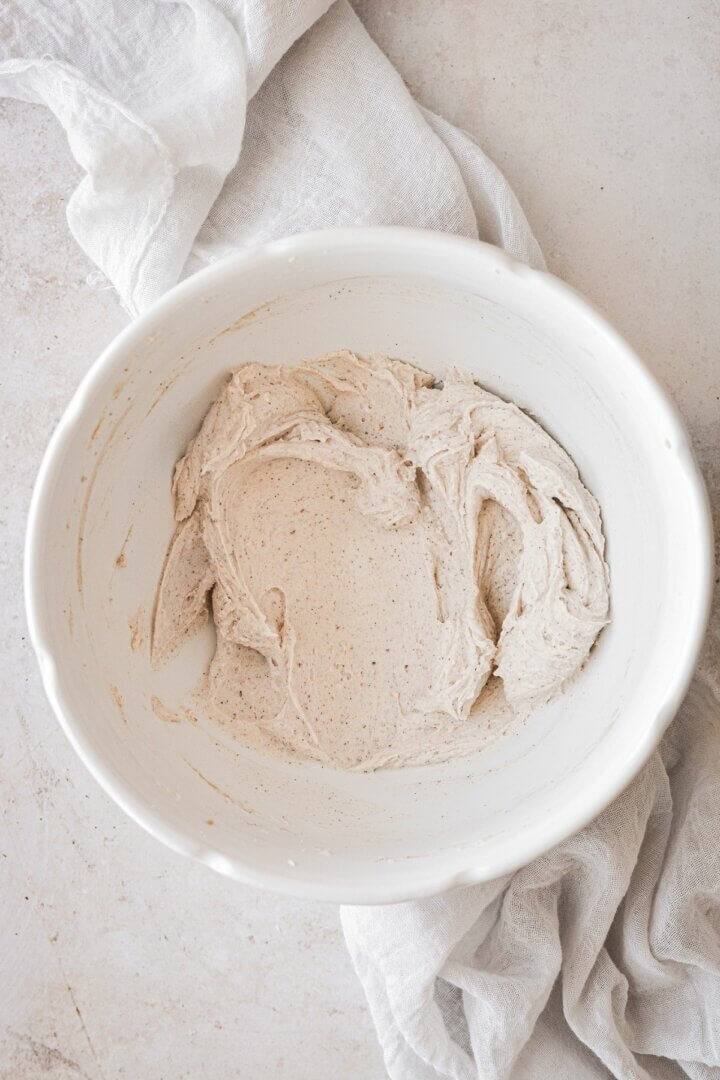 Brown butter cream cheese frosting in a bowl.