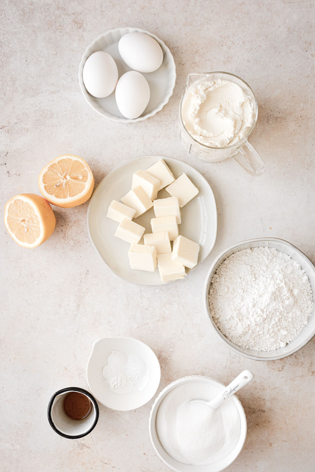 Ingredients for making an Italian lemon ricotta cake.