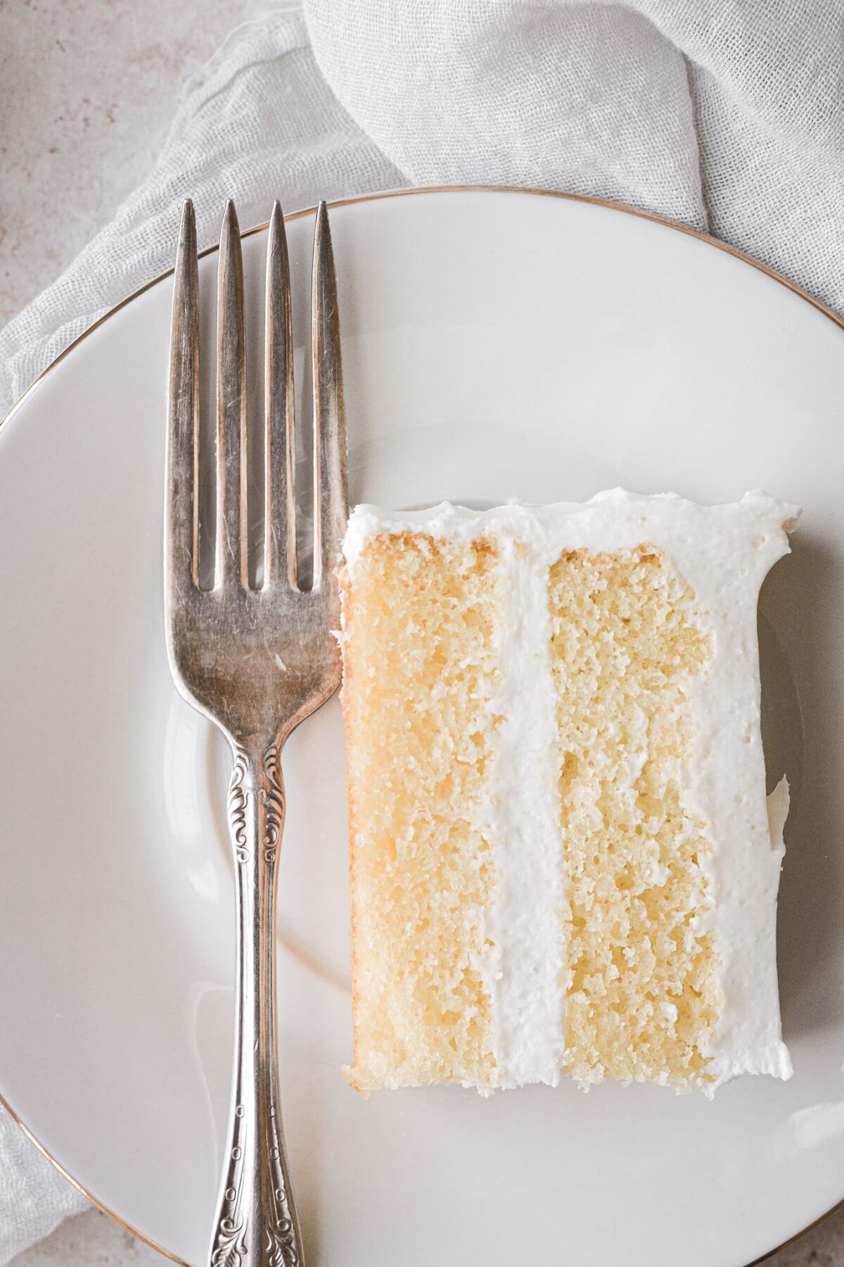 A piece of a mini vanilla cake for two.