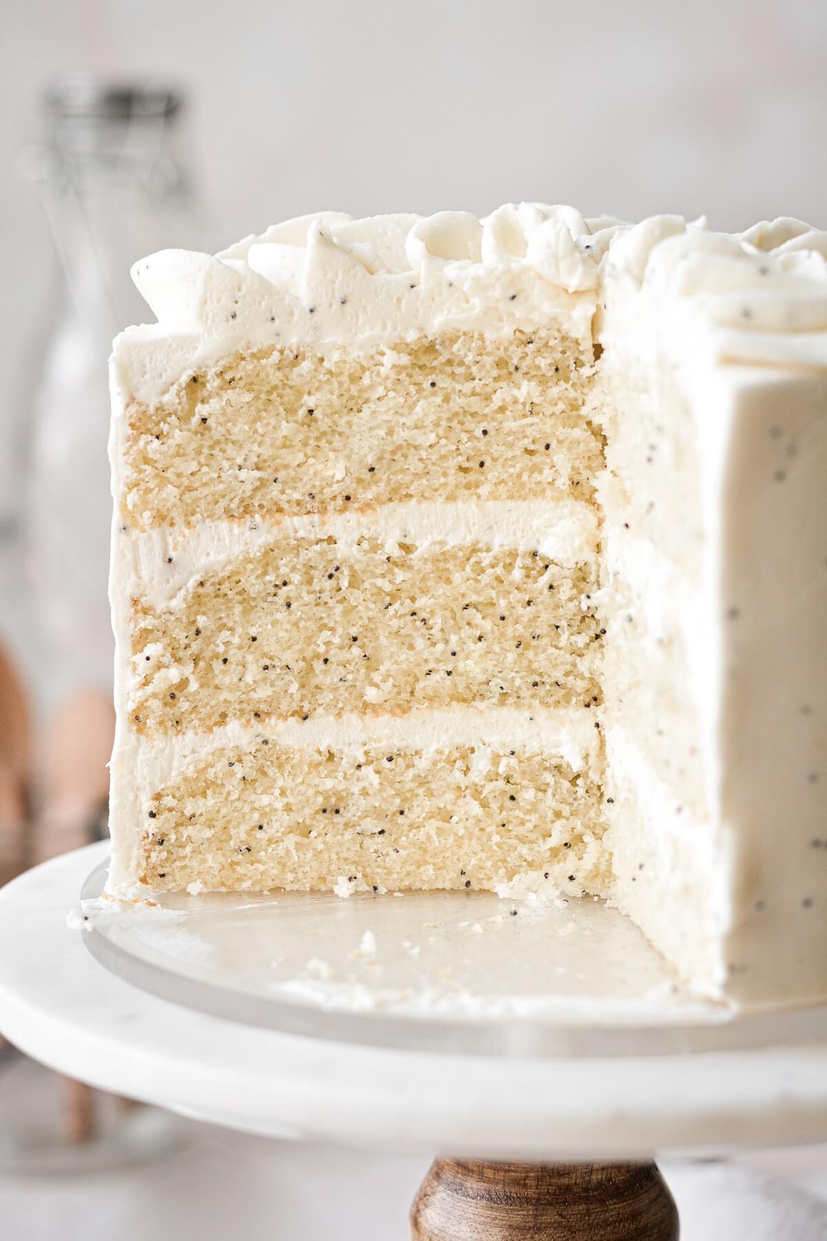 Inside layers of an almond poppy seed cake.