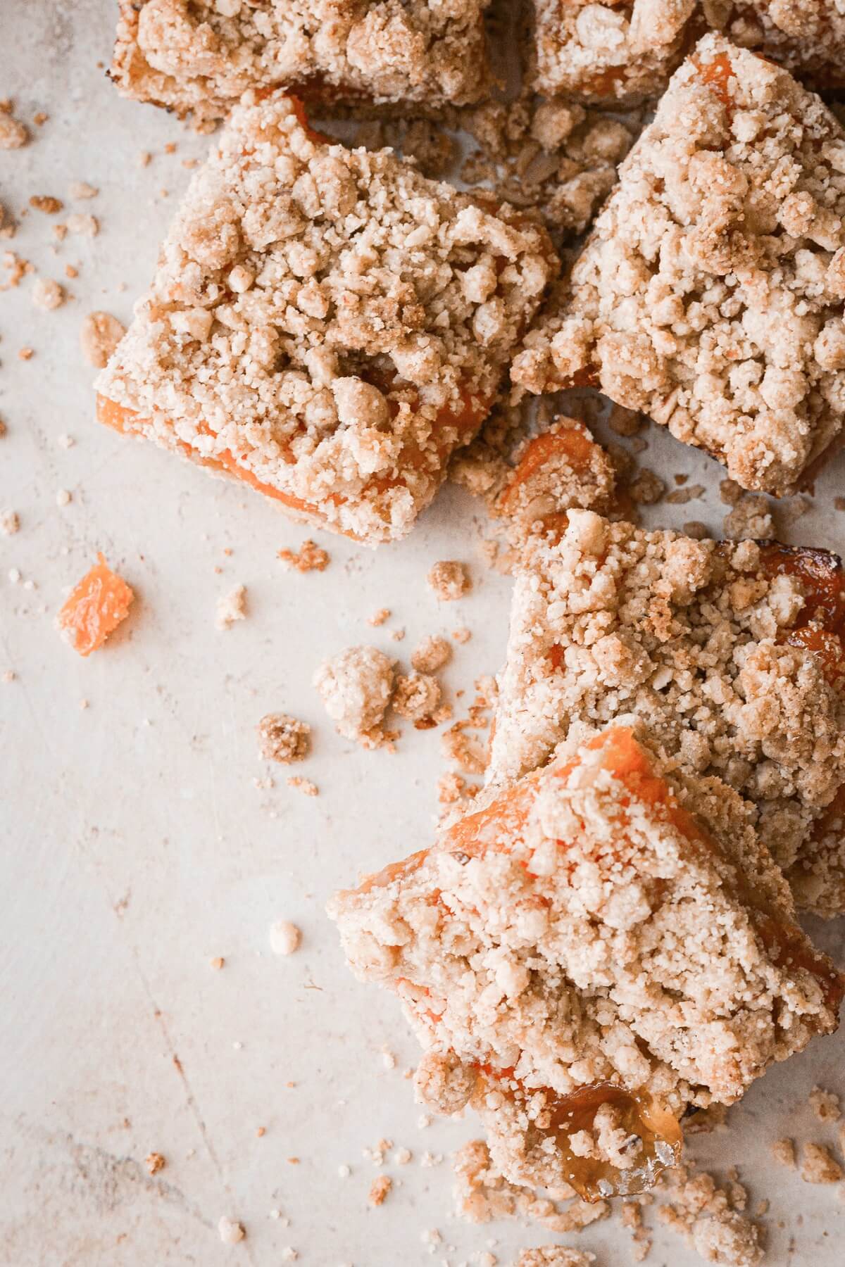 Apricot almond oat bars cut into squares.