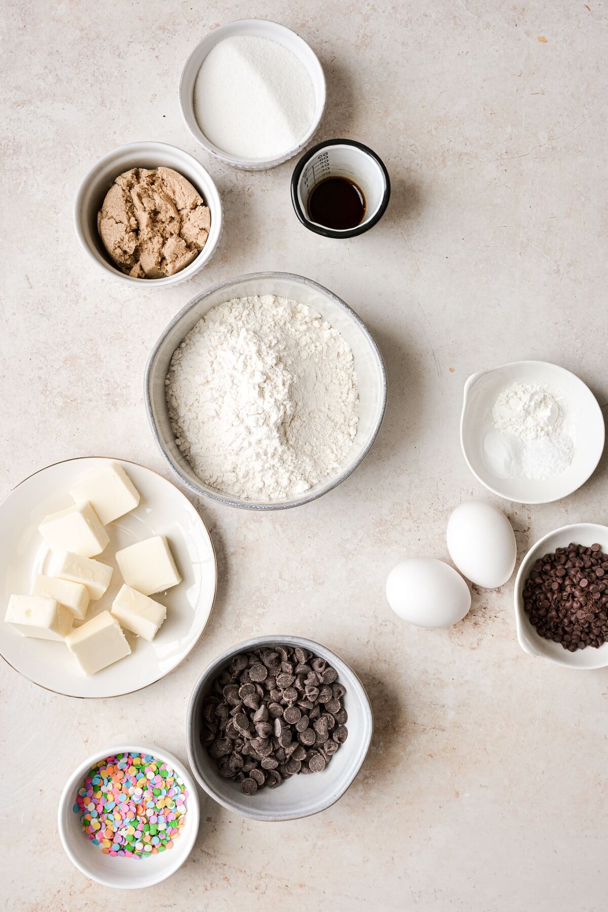Ingredients for making a big chocolate chip cookie birthday cake.