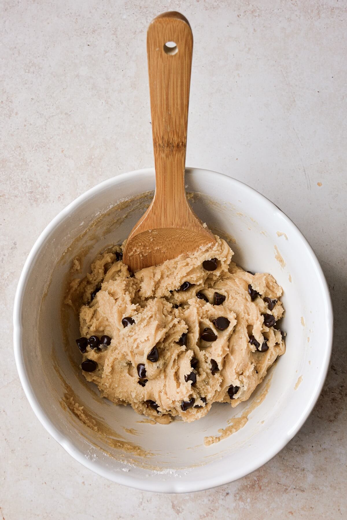Step 7 for making a big chocolate chip cookie birthday cake.